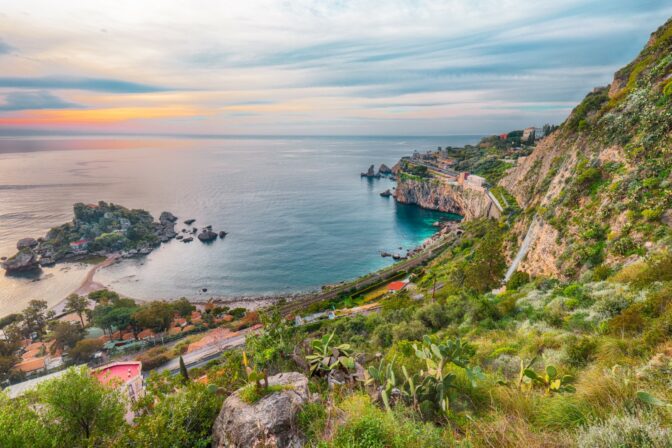 Panoramic aerial view of Isola Bella island and beach in Taormin