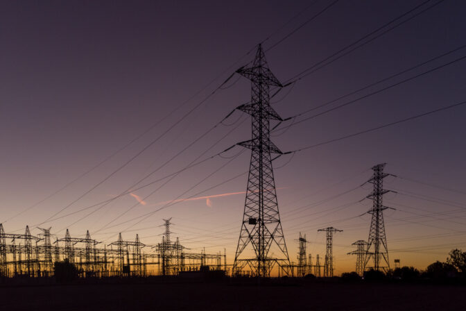 Electric substation at sunset