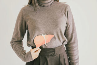 Woman holding liver paper cut, hepatitis vaccination, liver cancer treatment, world hepatitis day