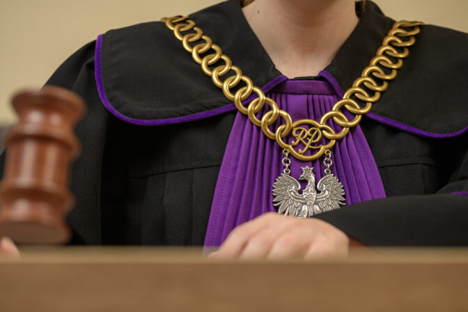 A courtroom in Poland, a judge issues a verdict