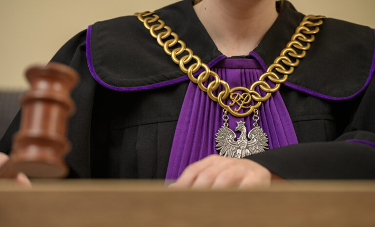A courtroom in Poland, a judge issues a verdict