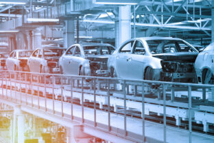 Car bodies are on Assembly line. Factory for production of cars in blue. Modern automotive industry. Blue tone