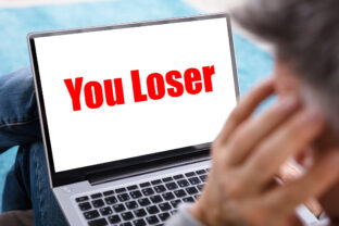 Person Looking At Laptop Screen