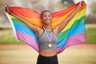 Cropped portrait of an attractive young female athlete celebrating her victory