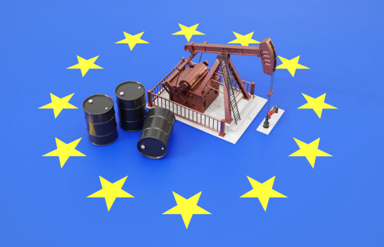 Oil pumpjack and oil barrels on European Union flag