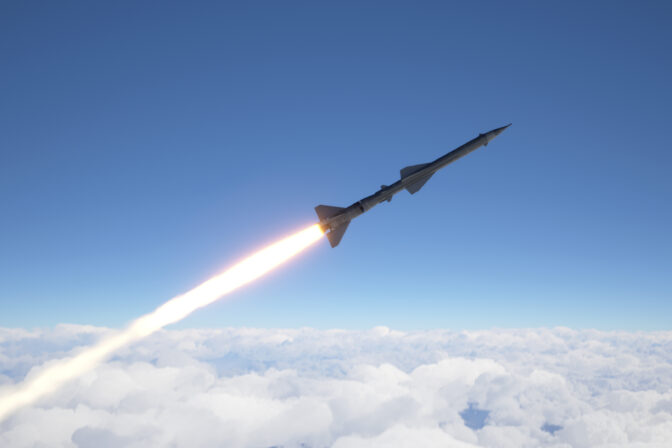 Cruise missile fly above the clouds
