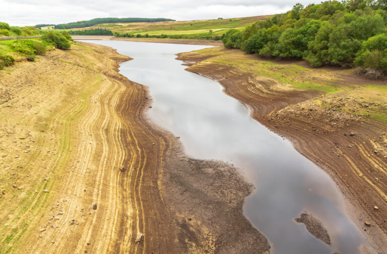 Leighton Reservoir in Nidderdale, North Yorkshire, UK, with very low water levels following a prolonged heatwave and no rainfall.
