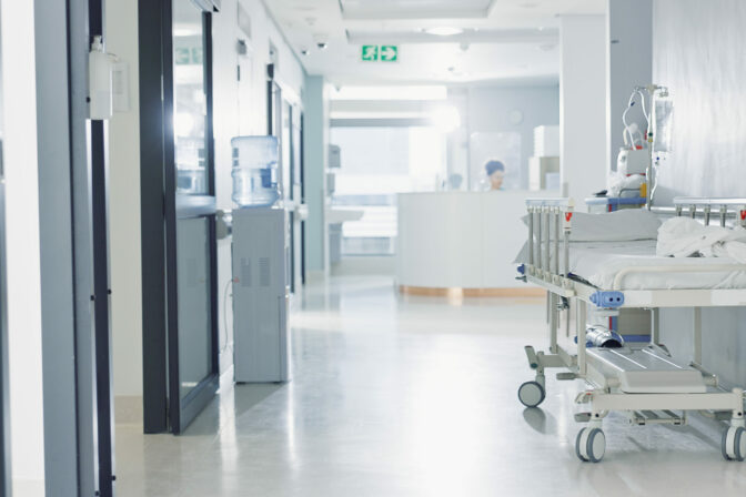 Hospital, healthcare and medical with an empty corridor for wellness, care or treatment and disease control. Medicine, service and hallway of a lobby in a clinic for rehabilitation or recovery