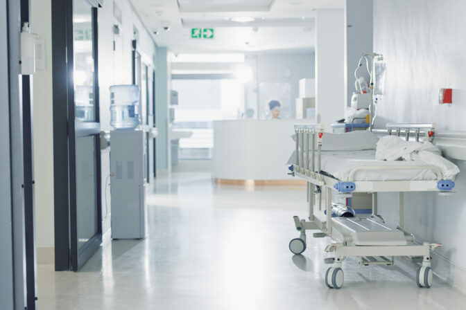 Hospital, healthcare and medical with an empty corridor for wellness, care or treatment and disease control. Medicine, service and hallway of a lobby in a clinic for rehabilitation or recovery