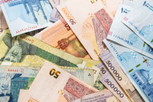 Background from different Iranian Rial or IRR banknotes from Iran.