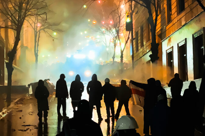 Tbilisi, Georgia - 1st december, 2024: aggressive georgian youth active protestors pov protest in Tbilisi capital at night in Rustaveli avenue. Georgians fight for freedom and Europe union integration