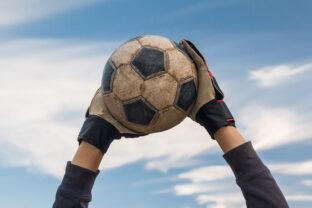 Goalkeeper catching the ball