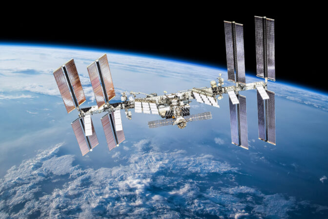 ISS station on orbit of the Earth planet. Elements of this image furnished by NASA