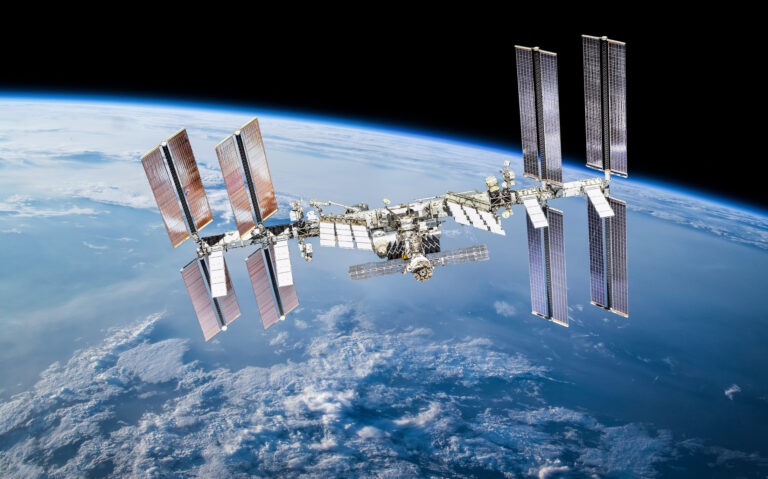 ISS station on orbit of the Earth planet. Elements of this image furnished by NASA