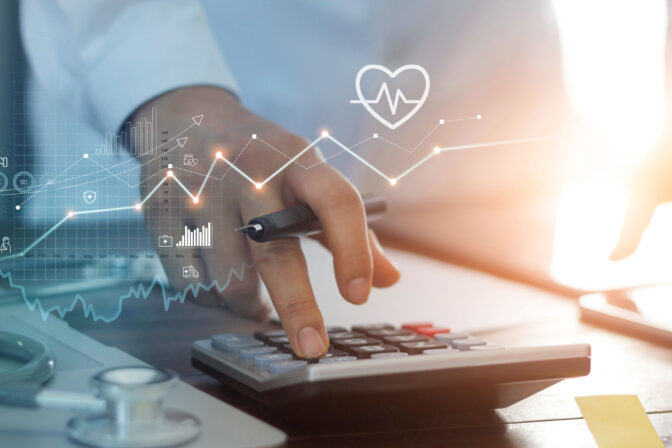 Healthcare business graph data and growth, Doctor use calculator and calculate healthcare costs and analyzing medical report on tablet.