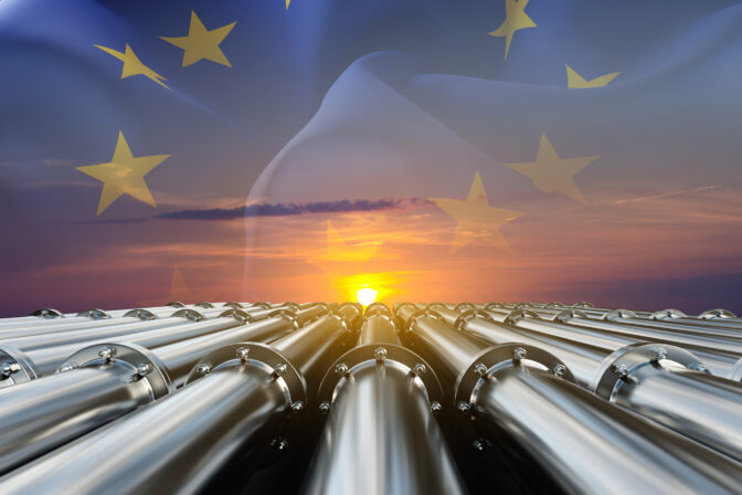 Gas or oil pipeline against the sunset with European Union flag
