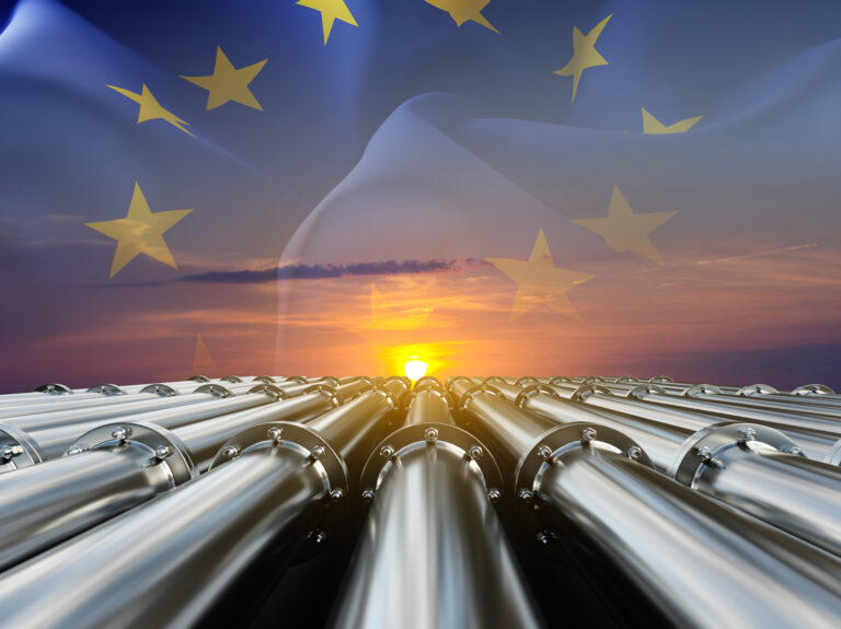 Gas or oil pipeline against the sunset with European Union flag