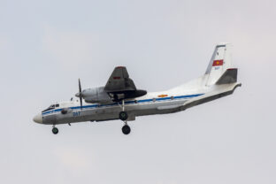 An Antonov An 26 Aircraft Of Vietnam People's Air Force With Registration 267 Landing At Tan Son Nhat International Airport.