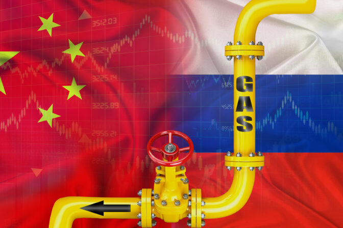 Gas pipeline with Russian and China flag. Production and export of Russian gas to China