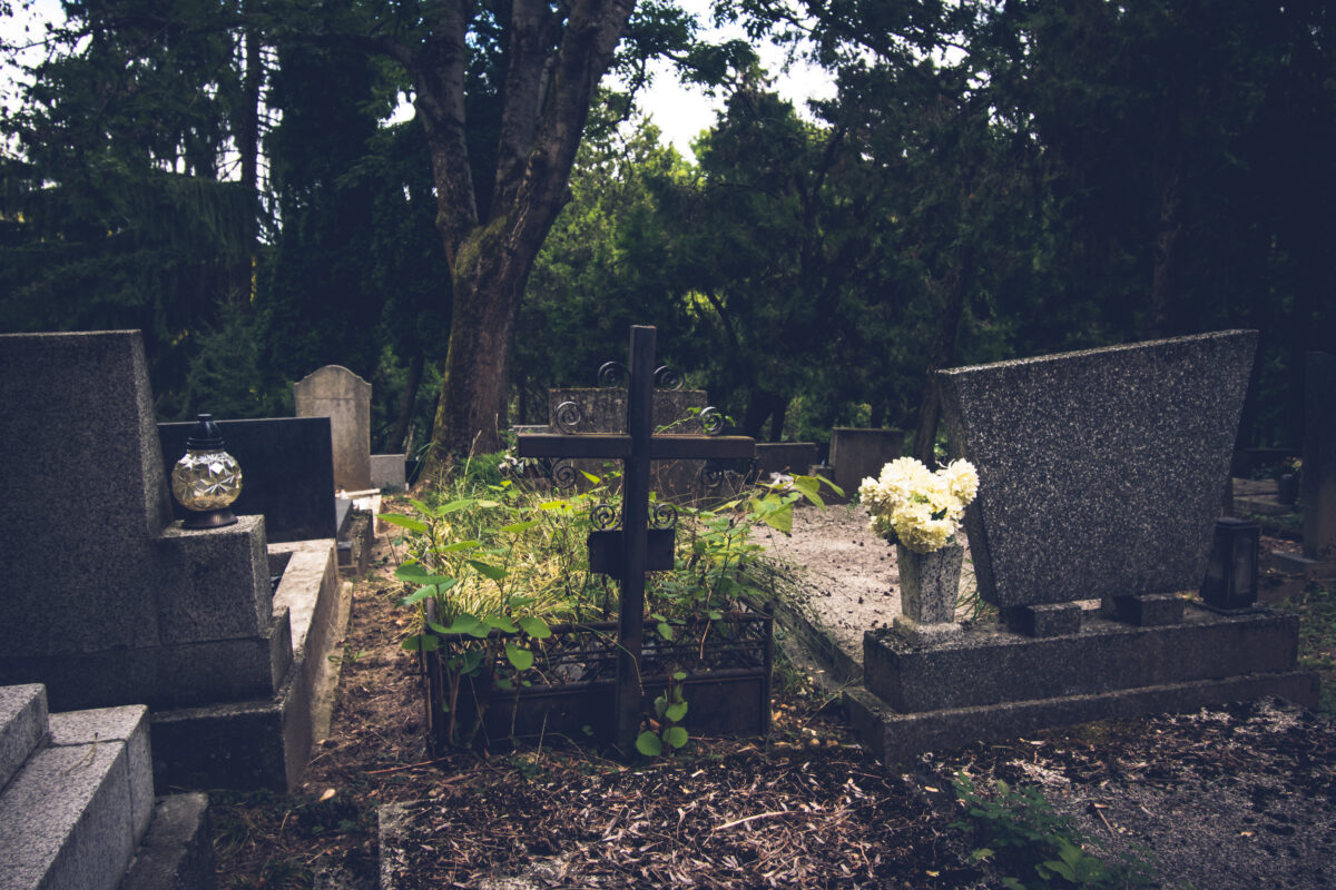 Graves and tombs decorated by flowers and candles during All Saints Day