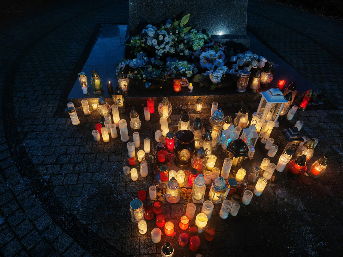Traditional candles at a cemetery on All Saints' Day in Europe