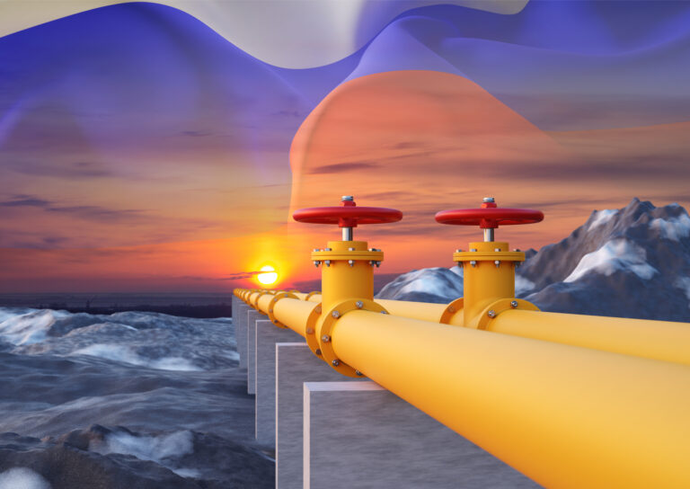 Pipeline with Russian Federation flag against the sunset. Import of gas from Russian federation