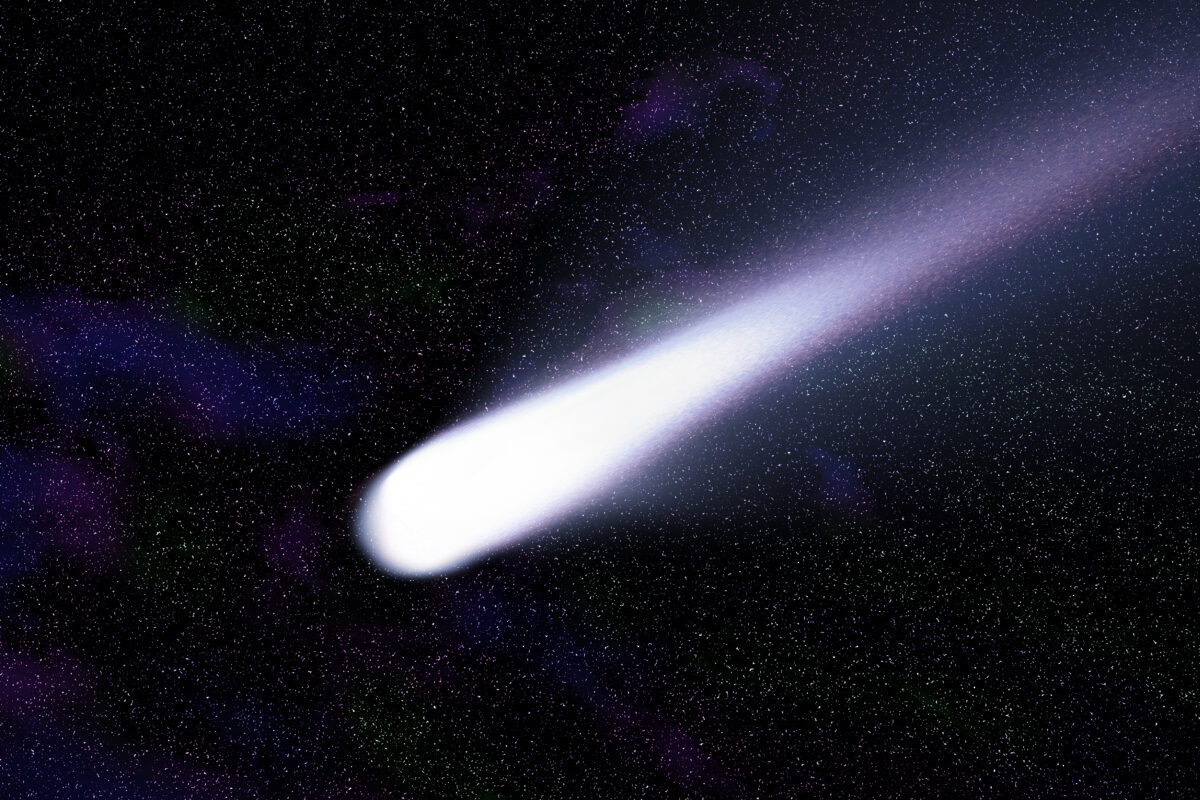Blue comet on the space with colorful nebula