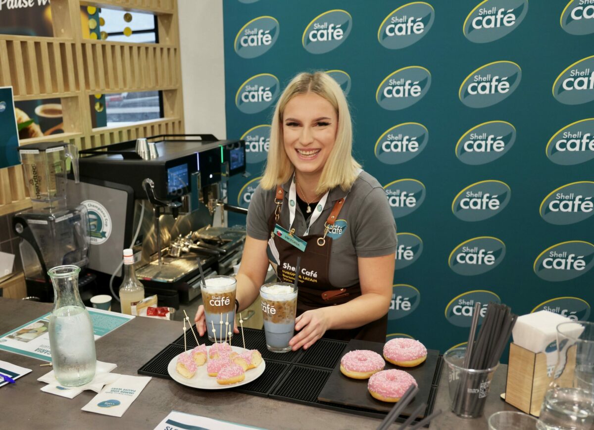 3 shell cafe barista cup 1st place winner viktoria macalakova serving signature drink.jpeg