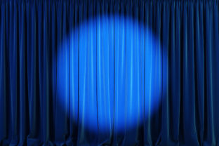Blue curtains with spotlight or flash.