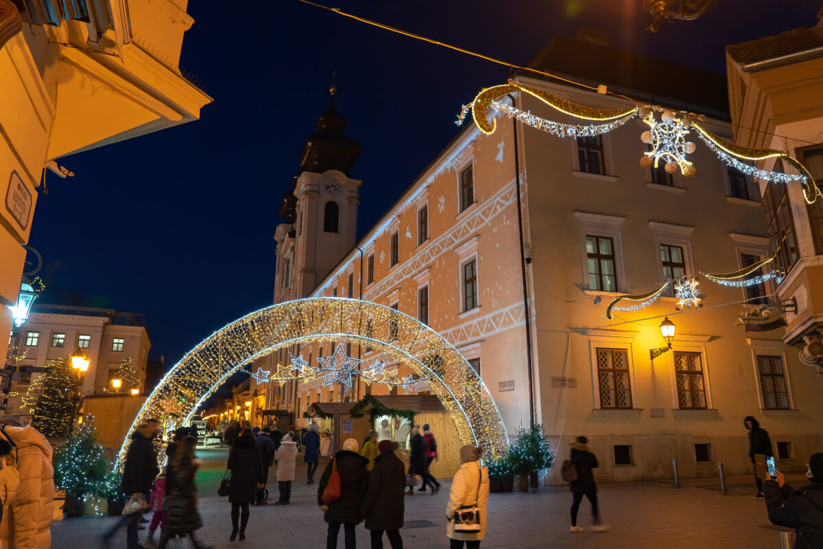 Christmas market in Gyor Hungary with lights and people