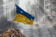 Dirty and torn Ukraine flag, symbol of resistance and victory. A scene of war and devastation, the ruins of a city destroyed by conflicts. 3D Rendering.