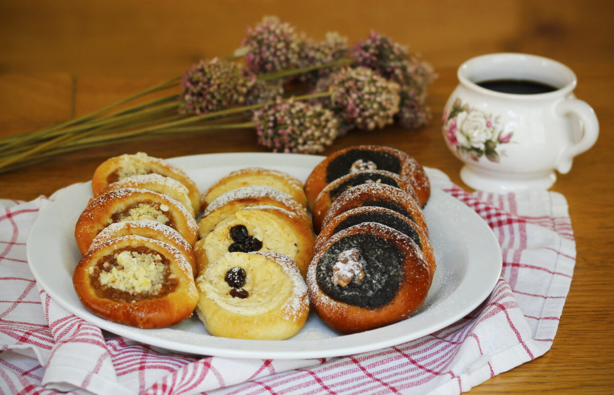 Traditional Czech festive kolache with apple, curd cheese and poppy seed filling
