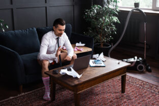Businessman without pants during job interview or online meeting during distant work from home