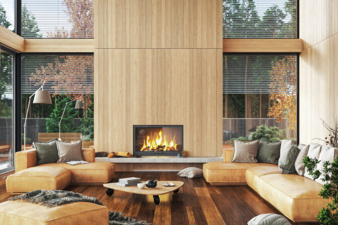 Modern interior with fireplace in house near forest
