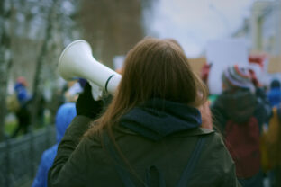 Young woman at demonstration