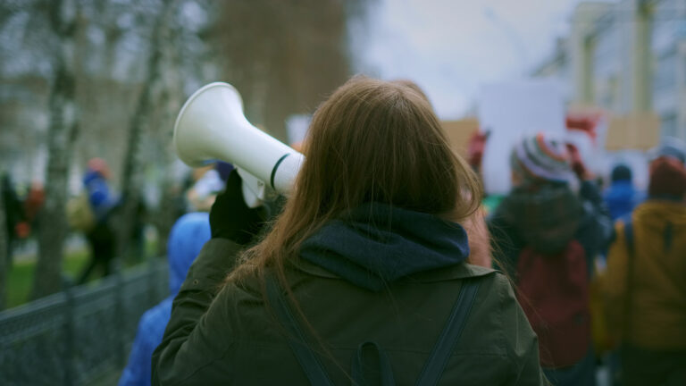 Young woman at demonstration