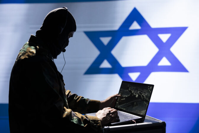 Mossad agent uses laptop to analyze surveillance data