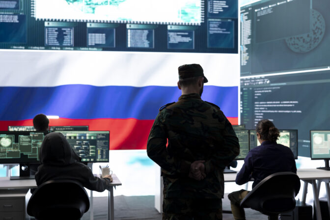 Military expert from Russian army working in governmental operations center