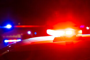 Police flashing lights at crime scene