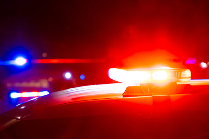 Police flashing lights at crime scene