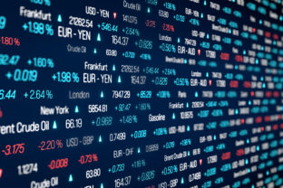 Stock market trading floor, stock index data, currency rates and commodity prices.