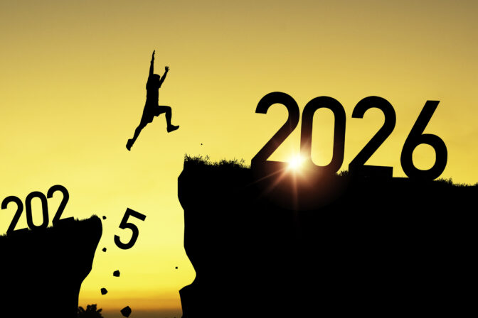 Welcome merry Christmas and happy new year in 2026,Silhouette Man jumping from 2025 cliff to 2026 cliff with cloud sky and sunlight.