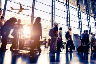 Blurred shot of people walking through Malaysia airport