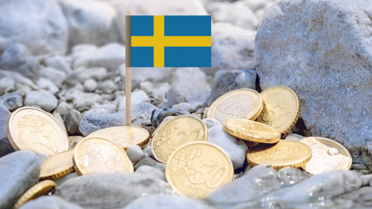 Flag of Sweden and euro currency coins on the riverbank.