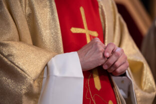 Hands of a Catholic priest