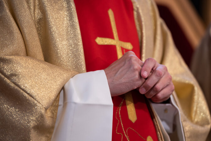 Hands of a Catholic priest