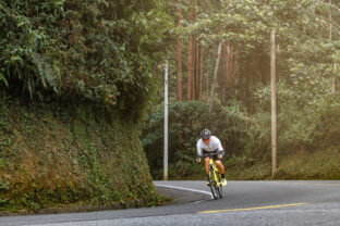 Racing to Victory: Cyclist Speeds Through the Road in a Thrilling Sprint