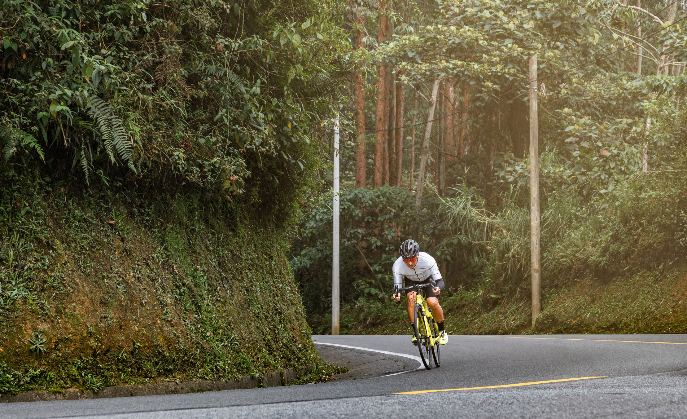 Racing to Victory: Cyclist Speeds Through the Road in a Thrilling Sprint