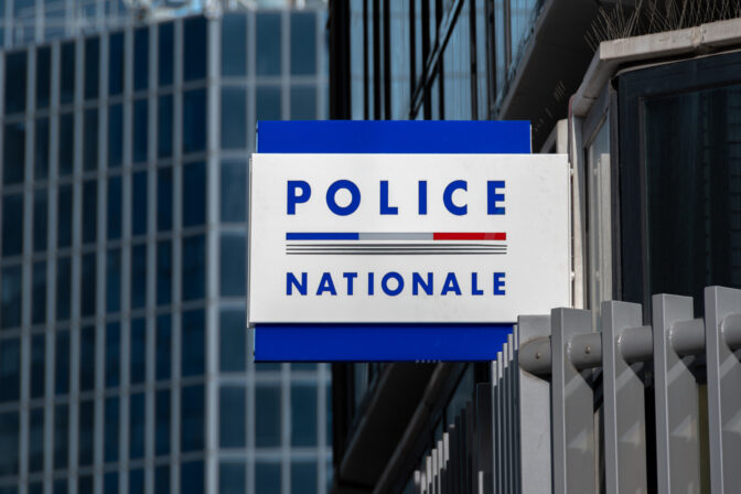 'POLICE NATIONALE' sign written in French on the facade of a police station in France