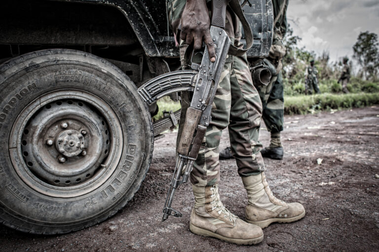 Mining in Congo: escort a convoy of Coltan mineral.